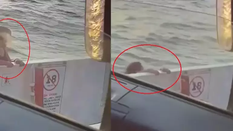 Feribotta ellerini bırakarak suya atladı!
